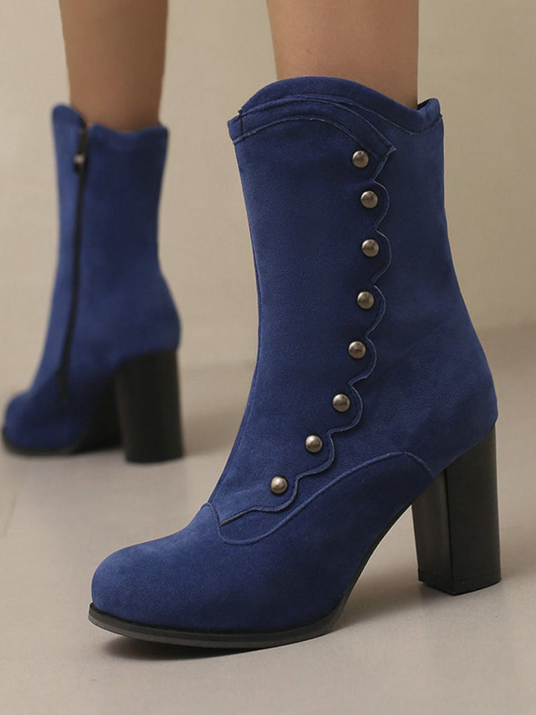 Bottes mi-mollet cloutées en daim doublées de fausse fourrure