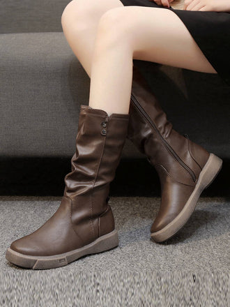 Bottes plates plissées en cuir marron