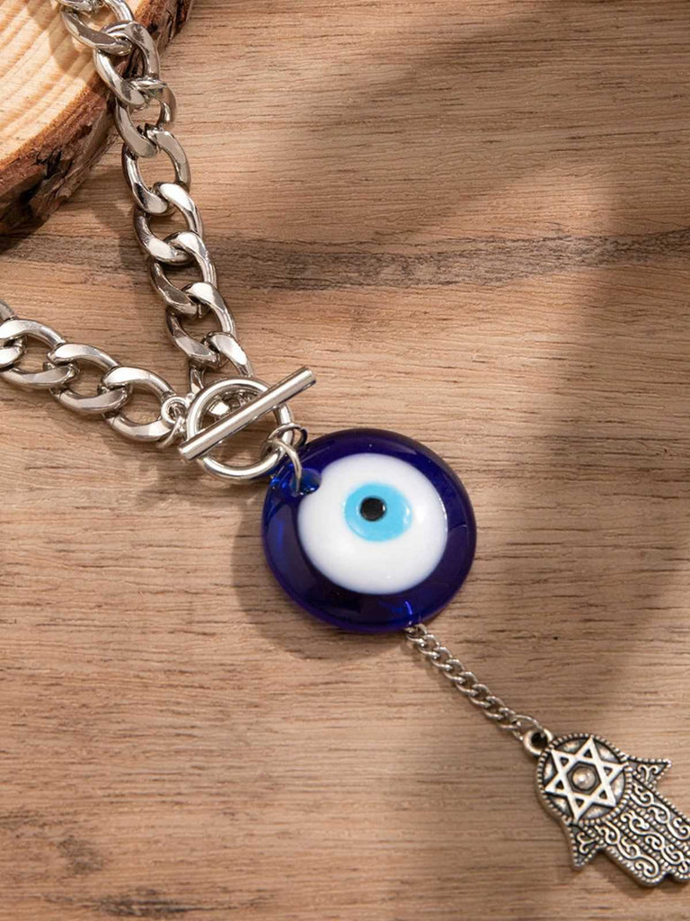 Collier pendentif gothique en forme de paume avec œil de démon