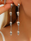 Boucles d'oreilles pendantes argent style gothique tête de mort