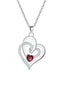 Collier vintage à double cœur entrelacé et cristal rouge