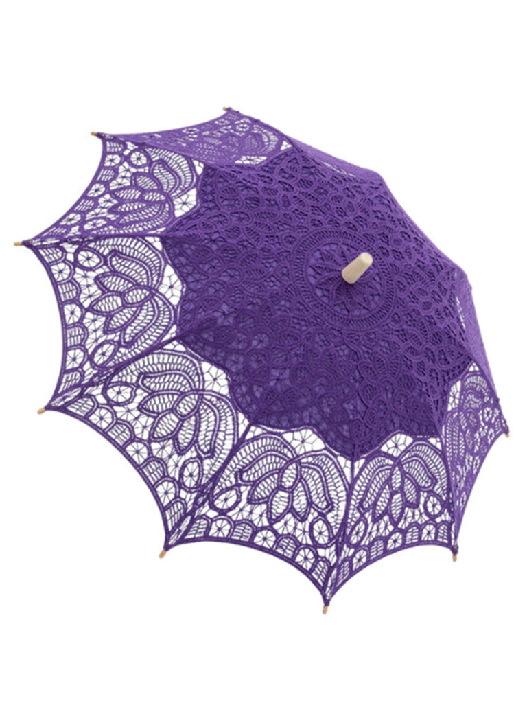Parapluie vert ajouré en dentelle florale