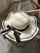 Chapeau de plage vintage à bords ondulés avec nœud