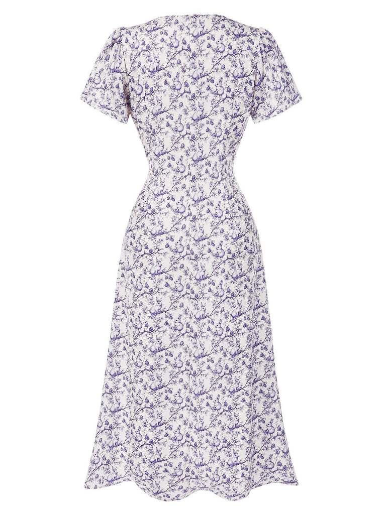 Robe rouge à col en V à fleurs des années 1940