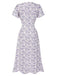 Robe rouge à col en V à fleurs des années 1940