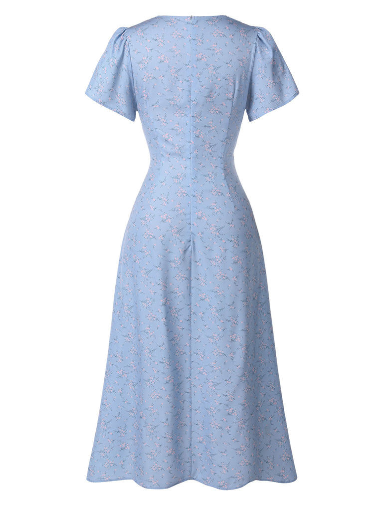 Robe rouge à col en V à fleurs des années 1940