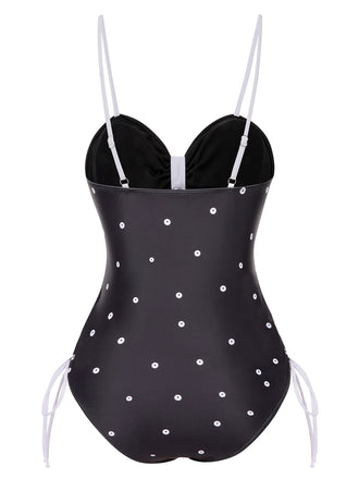 Maillot de bain noir à pois avec nœud papillon des années 1950