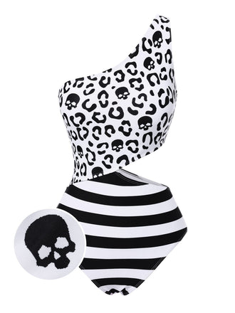 Maillot de bain noir à rayures et tête de mort une épaule ajourée années 80