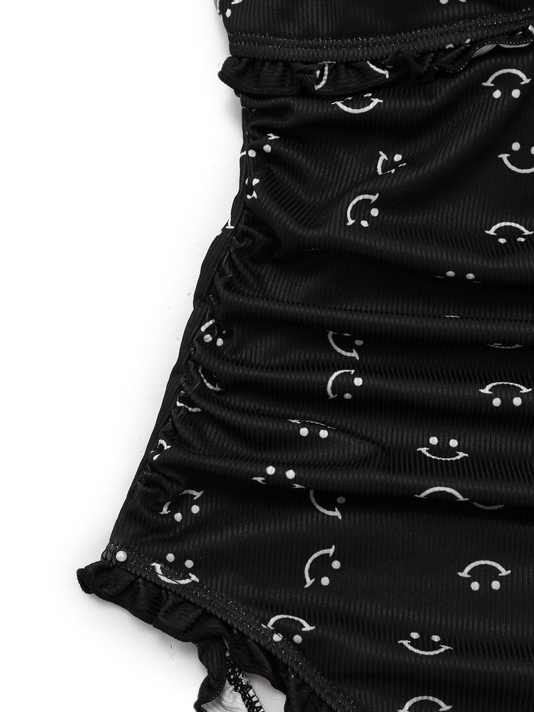 Maillot de bain une pièce noir à volants et bretelles imprimé sourire années 1930