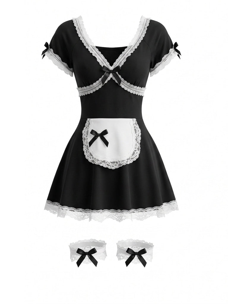 Robe courte noire costume de soubrette en dentelle à nœud et jarretelles années 1980