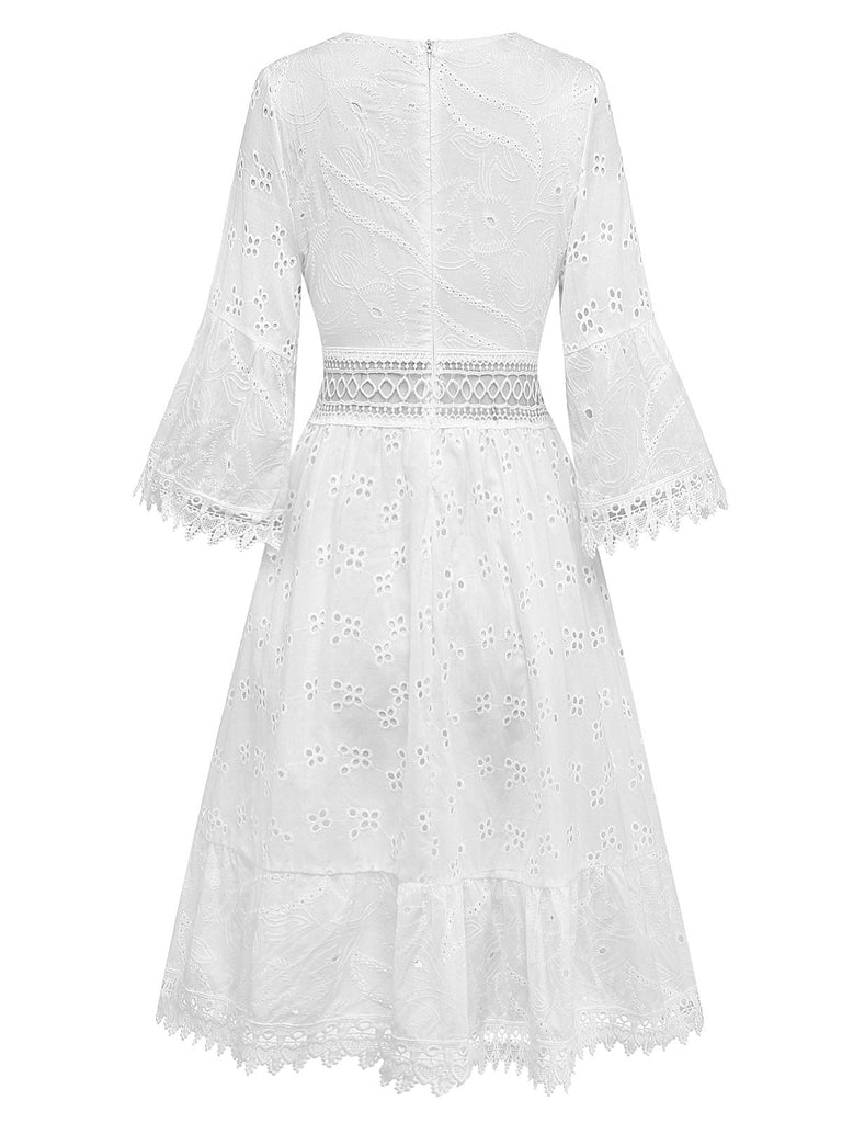 White lace dress on a white background