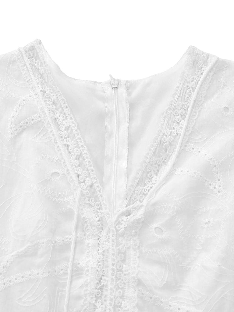 Close-up of a white lace garment on a white background