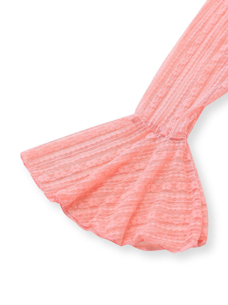 Close-up of the flared bell-sleeve detail on the delicate pink lace beach cover-up.