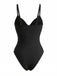 Rear studio view of the black swimsuit showcasing the simple, sleek back design and adjustable straps.