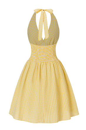 Robe à carreaux jaunes col v dos nu des années 1960