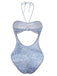 Rear view of the denim-print swimsuit showing the halter tie and the full-coverage back design.