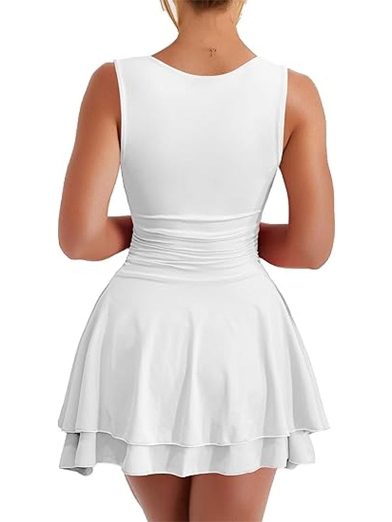 Rear view of a model wearing the white sleeveless tiered mini dress.