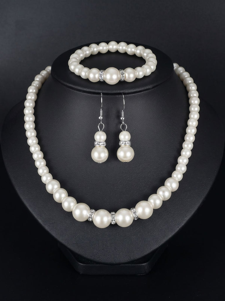 Parure 3 pièces collier, bracelet et boucles d’oreilles pendantes à perles blanches - 1