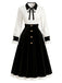 [Prévente] Robe noire et blanche à nœud contrastant, boutons et manches lanternes Années 1950 - 2