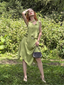 Robe verte ourlet mouchoir scintillant 1920s