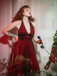 Robe trapèze rouge années 50 en maille à pois cocktail chic