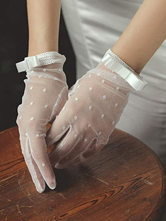 Gants en maille à pois et nœud papillon
